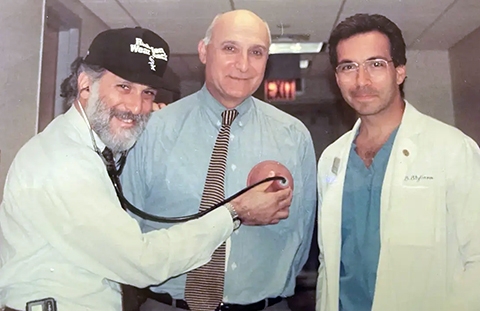 Peter Altman, MD (center), Charles J Stolar, MD (left), and Steven Stylianos, MD (right) circa 1994, photo courtesy of NYP