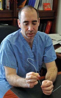 Dr. Morrissey demonstrates the catheter used in Adrenal Venous Sampling